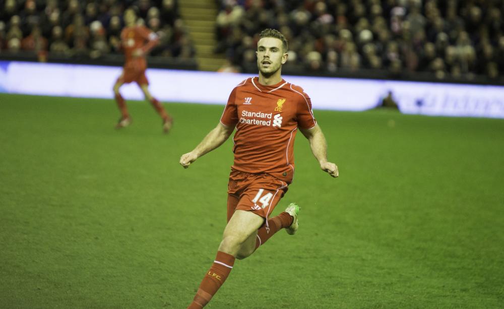 Jordan Henderson playing for Liverpool FC
