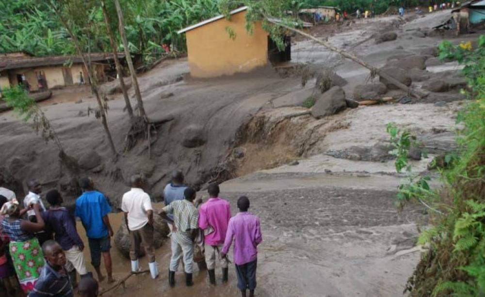 Villagers surveying damage from mudslides