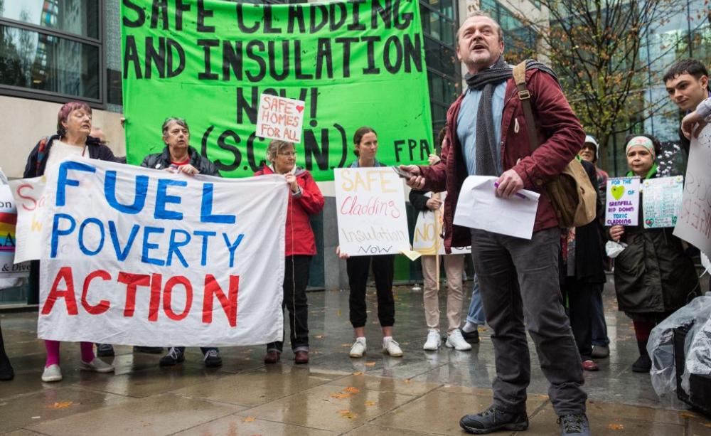 Phil Murphy, ex-firefighter and member of SCIN, speaks at the demo