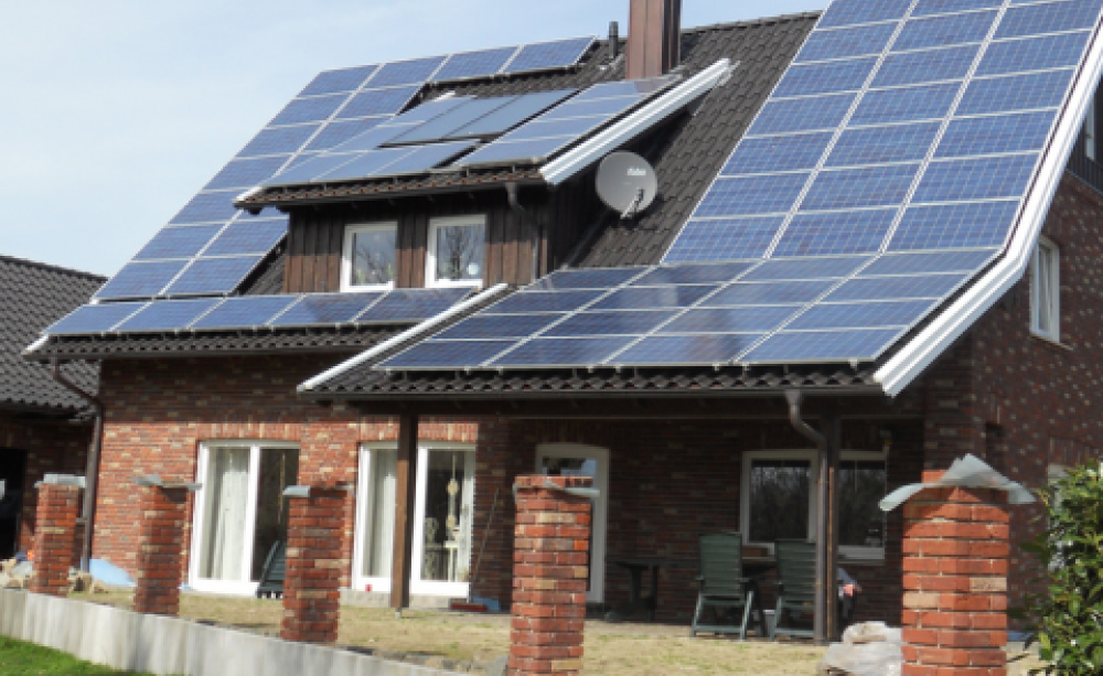 Solar is everywhere in Germany. This is a newly constructed home with near total solar covering. Photo: Tim Fuller via Flickr.com.