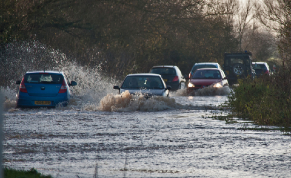 A flooded A361 on the Somerset Levels. Photo: Mark Robinson via Flickr.com.