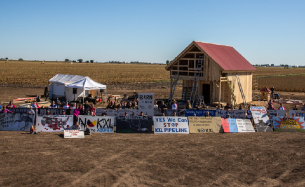 Bold Nebraska draws the line - ranchers and farmers have built a renewable energy powered barn in the path of the Keystone XL pipeline. Photo: 350.org via Flickr.com.