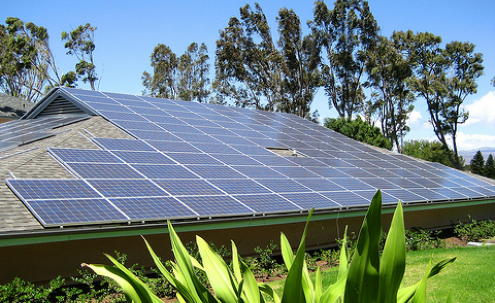 Solar PV hard at work on a hotel roof in Hawaii. The state has resisted proposals for heavy charges for solar connections to the power grid. Photo: ShellVacationsHospitality via Flickr.com.
