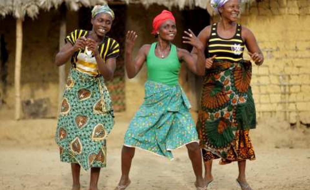 Celebrating. Photo: Jason Taylor for Friends of the Earth 2014.