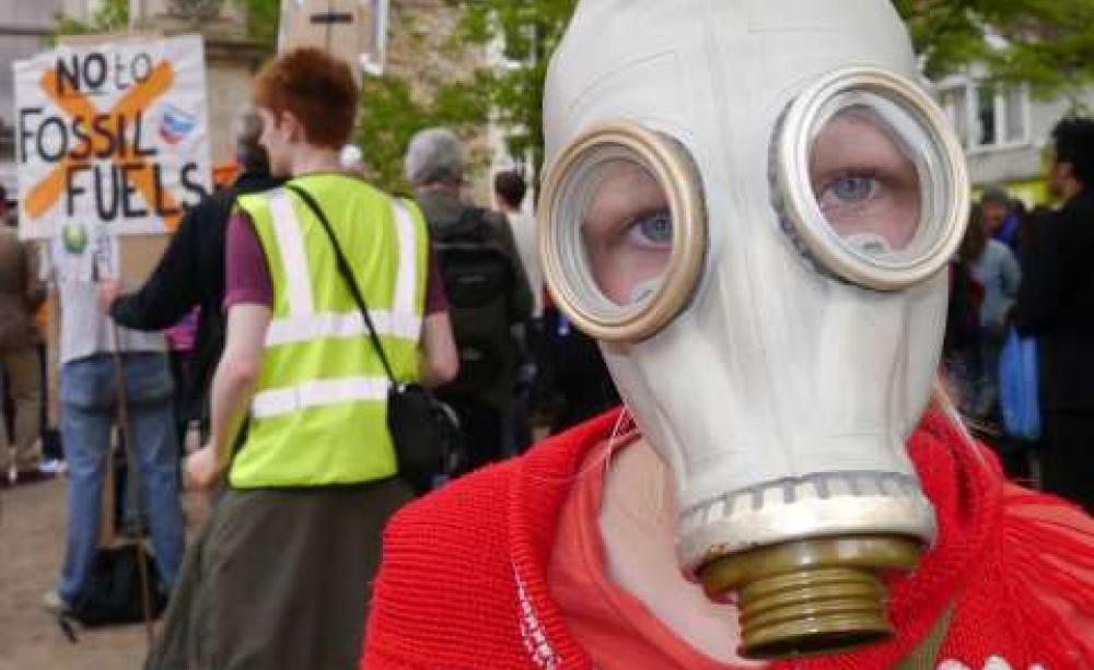A young demonstrator in Oxford yesterday calling on the University to divest from fossil fuels. Photo: Zoe Broughton.