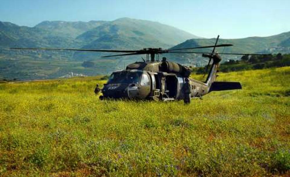 An Israeli Black Hawk helicopter lands in the well-watered Golan Heights. Photo: Sgt. Ori Shifrin / Israel Defense Forces via Flickr.