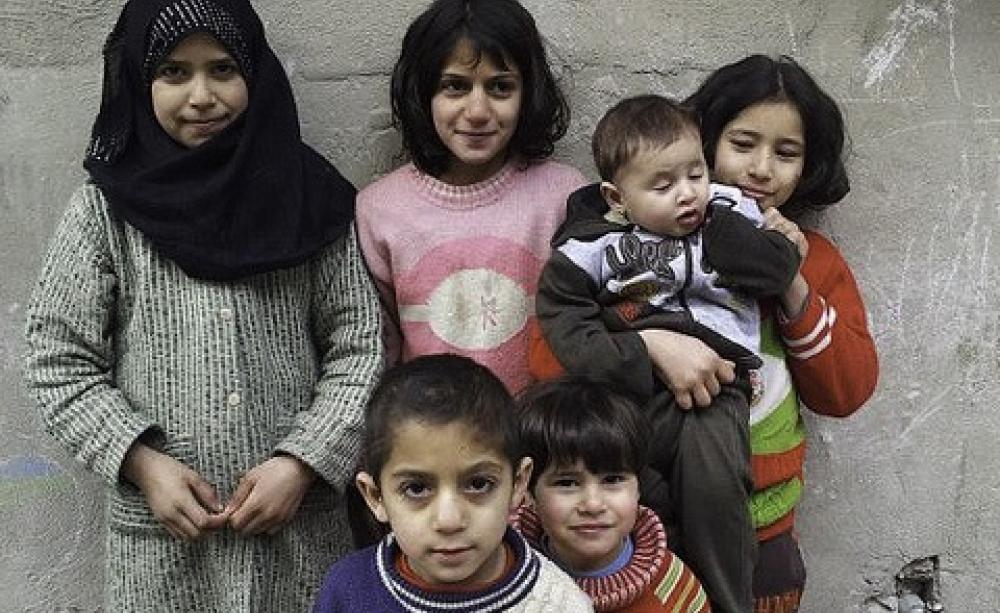 Even if they survive the war, these children in Homs face a toxic future for many years to come from the release of industrial toxins and residues from munitions, propellants and explosives. Photo: Freedom House via Flickr.
