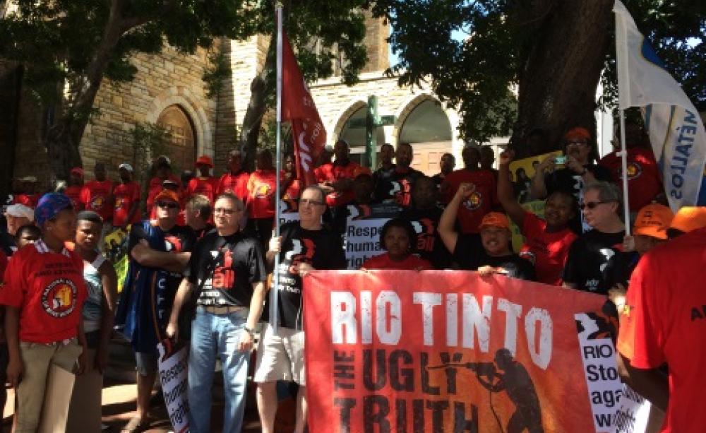 Unionists protest at RT's labour practices in Cape Town, South Africa, February 2014. Photo: IndustriALL.