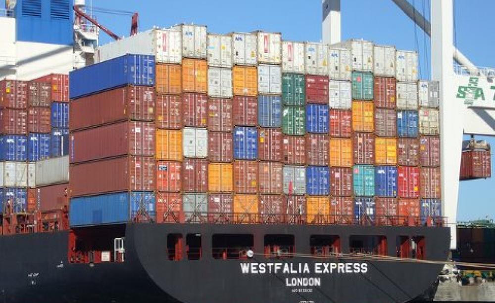 A container ship in port, Oakland, CA. Photo: Jim Bahn via Flickr.