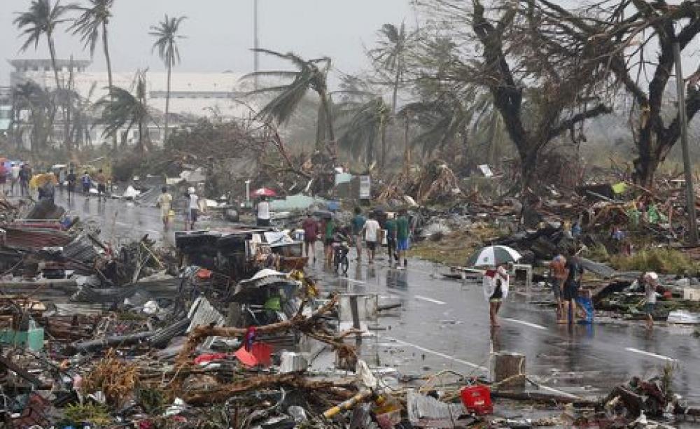 Typhoon Haiyan - the aftermath, 10th November 2013. Photo: Reuters / Erik De Castro via Mans Unides / Flickr.