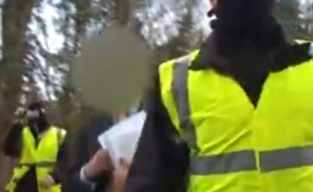 The moment when journalist and photographer Adrian Arbib was served with an injunction preventing him from photographing an environmental protest at Radley lakes, 2007. Photo: still from video by Adrian Arbib.