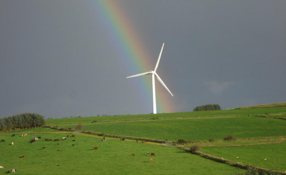 The wind turbine at the end of the rainbow. Photo: geogrpah.org.uk / Wikimedia Commons.
