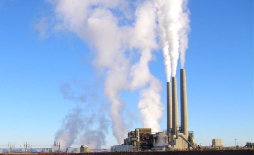 What goes up, must come down. Arizona's Navajo Generating Station consumes up to 25,000 tons of coal per day, and the mercury it emits - along with other coal plants - is poisoning our oceans, our fish, and us. Photo: Alan Stark via Flickr (CC BY-SA 2.0).