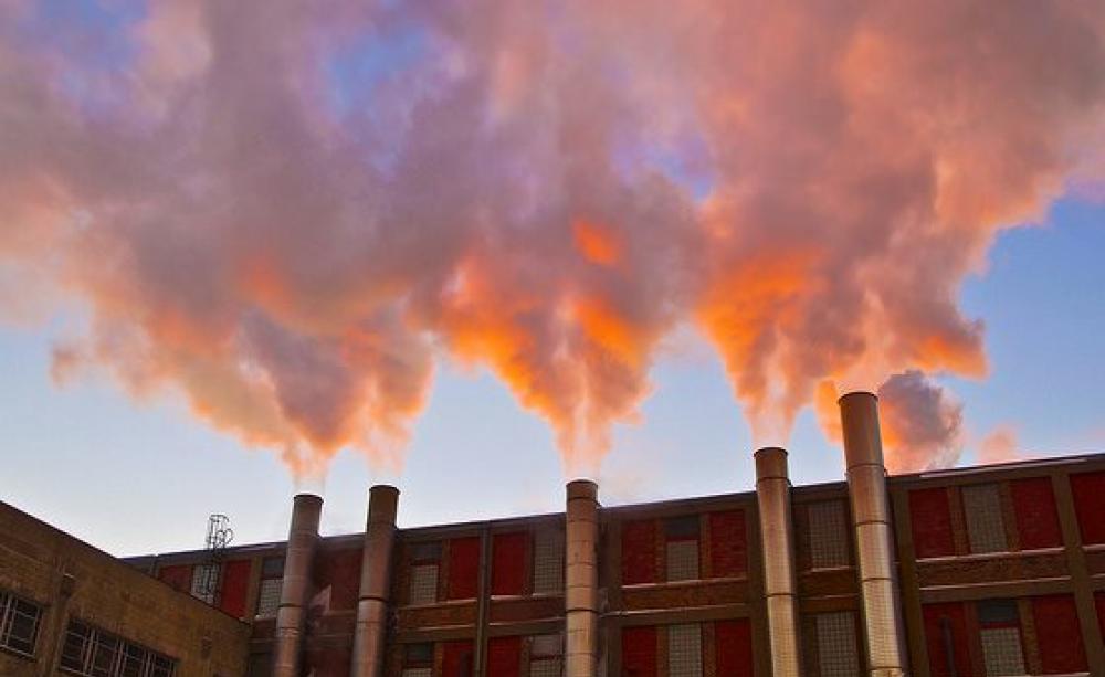 Industrial fumes caught in early morning sunshine in Chilwaukee, Wisconsin. Photo: Light Brigading via Flickr (CC BY-NC 2.0).