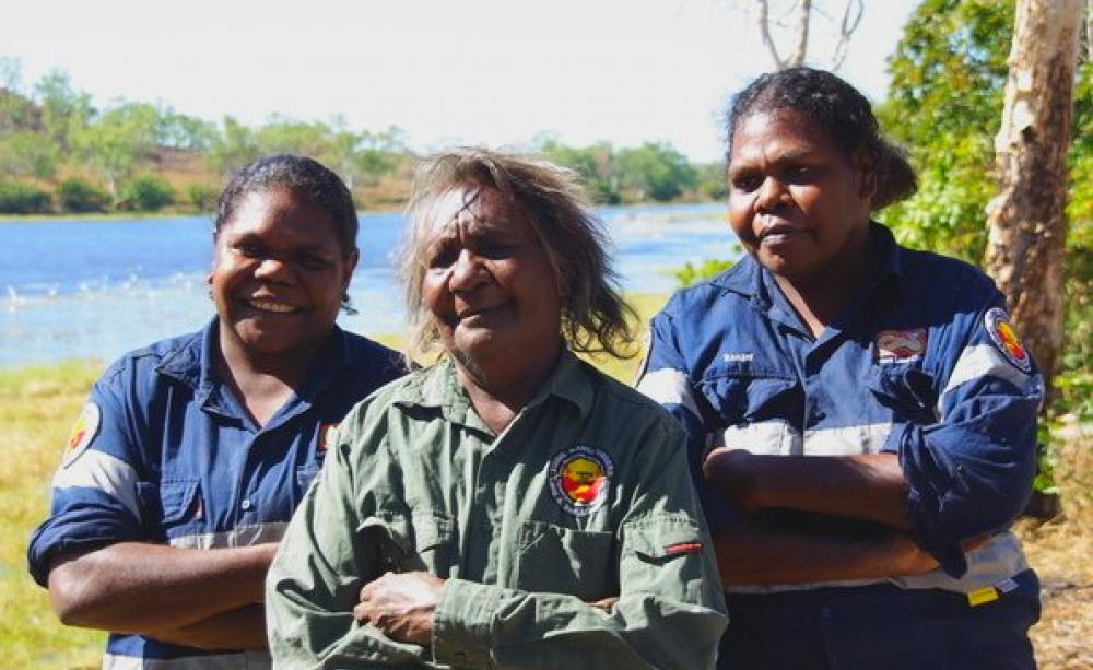 Indigenous rangers like Yugul Mangi senior women (from left to right) Edna Nelson, Cherry Daniels and Julie Roy, are crucial guardians of the outback environment. Photo: Emilie Ens, Author provided.