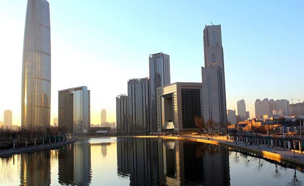 The dazzling pace of development in China comes at a human cost - of those dispossessed to make way for it all. Tianmu is one of the villages in the way of the expansion of Tianjin, pictured. Photo: Yang Aijun / World Bank via Flickr (CC-BY-NC-ND).