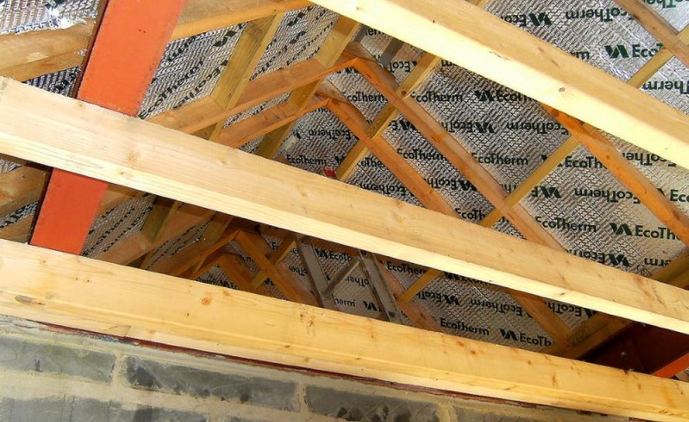 Insulating homes is much less glamorous than building a nuclear power station - but a much better national investment for health, comfort, jobs, climate and a flourishing economy! Photo: Martin Pettitt via Flickr (CC BY).