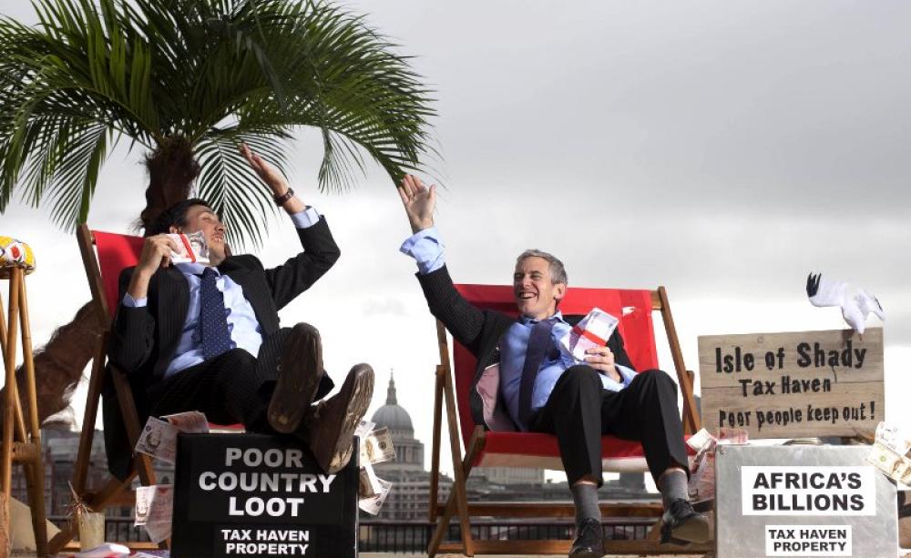Trade, Tax &amp; Transparency summit on the 'Isle of Shady',  a pop-up tax haven on the South Bank of the Thames at Gabriel's Wharf in London ahead of the Open for Growth: Tax, Trade &amp; Transparency event in June 2013. Photo: David Parry / Enough Food IF via F