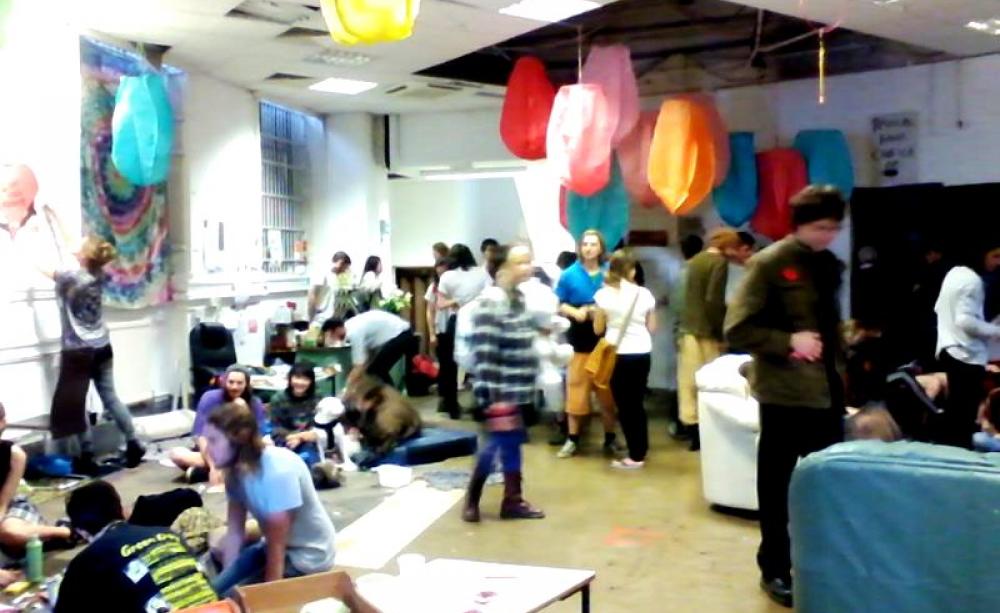 Radical Bankers gather in their social centre in an abandoned bank. Photo: The Source Brighton.
