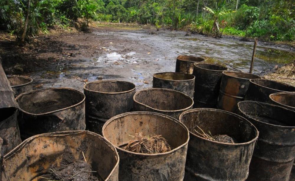 Texaco's toxic signature, written in spilt oil: Lago Agrio in the Ecuadorian Amazon. The company, now part of Chevron, has yet to compensate the victims of its pollution, or clean up. Photo: Julien Gomba via Flickr (CC BY).