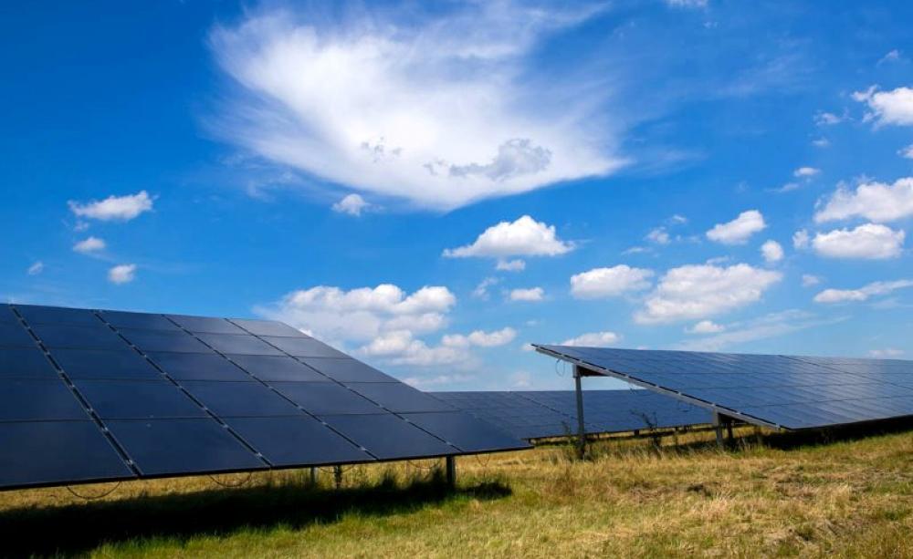 Solar panels A field of solar panels under a blue sky