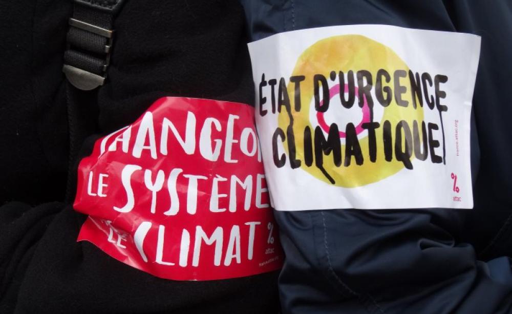 Will it all be in vain? Human Chain in Paris before the opening of the COP21, 29th November 2015. Photo: Jeanne Menjoulet via Flickr (CC BY-NC-SA).