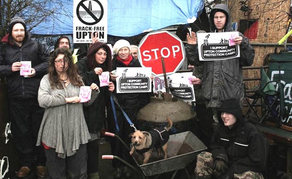 While negotiators were reaching their agreement at COP21 in Paris, members of the Upton Community Protection Camp were defending the UK from fracking. They still are. And the fight continues. Photo: Upton Community Protection Camp via Facebook.