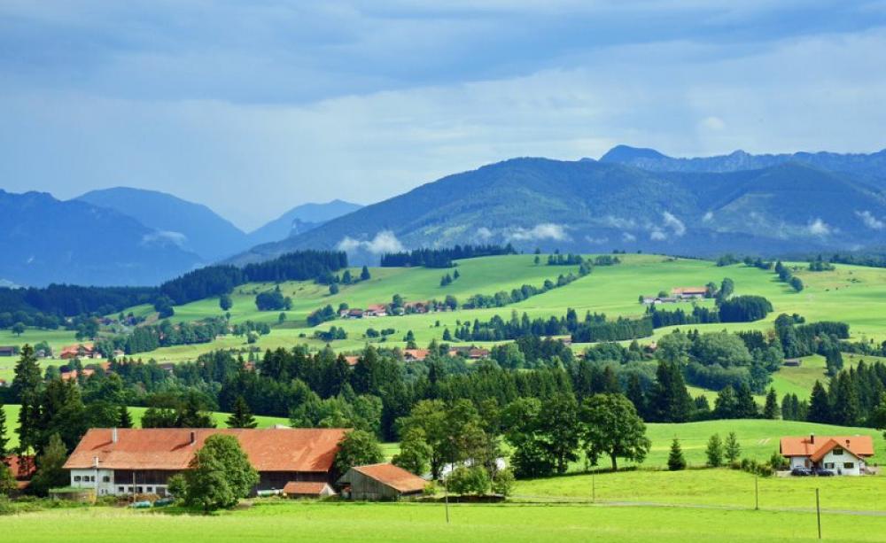 Under TTIP, this landscape of small farms interspersed with trees and woodland in the foothills of the Alps in Bavaria, Germany, might be unable to survive. Photo: Renate Dodell via Flickr (CC BY-ND).