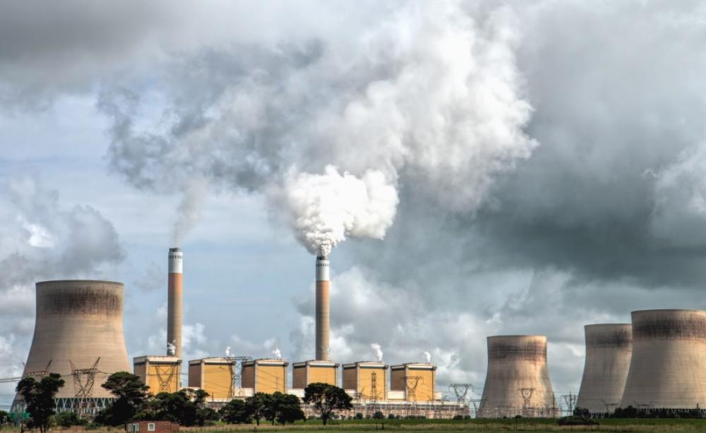 The emissions from a Nuclear Plant mix with the clouds above