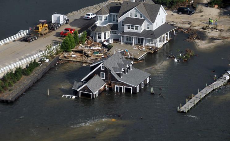 Luxury homes submerged in flood water