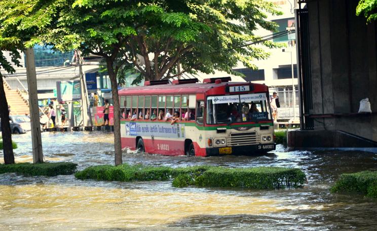 Bus driving through flood