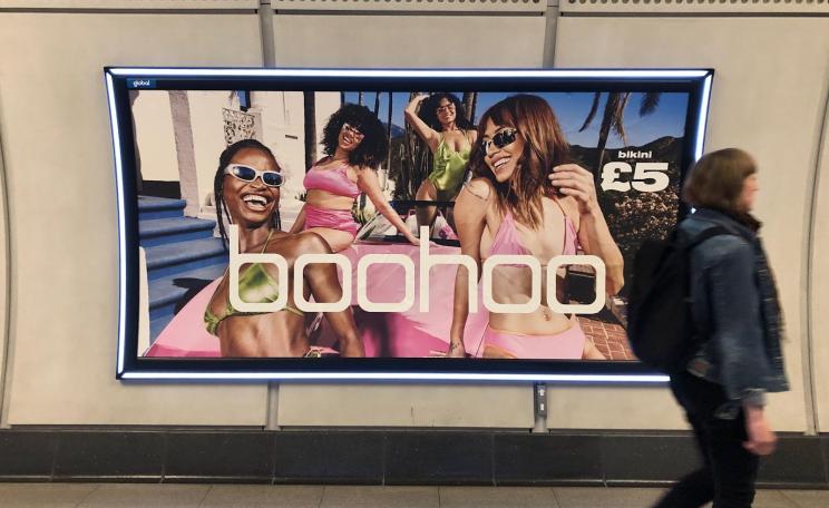 Boohoo fashion advert on Transport for London's tube network in London, UK, in 2023.