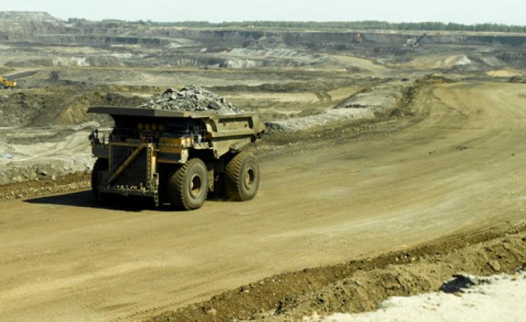 Dumper truck on tar sands road