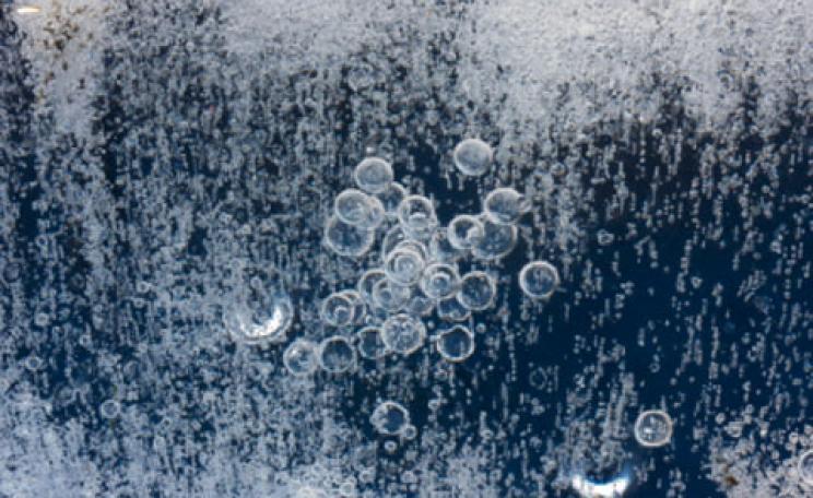 Tiny bubbles of methane trapped in lake ice in Norway