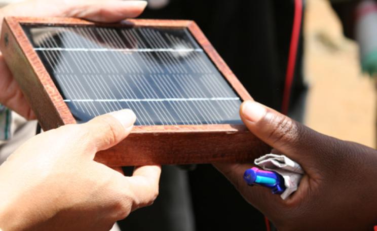 A small solar panel framed in wood