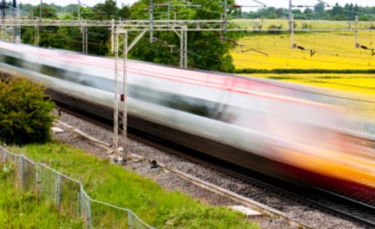 High speed train speeding by in a blur