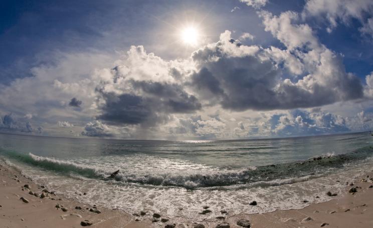 Beautiful but threatened by rising seas: Betio island, Kiribati. Photo: Shevelev Alexey / Shutterstock.
