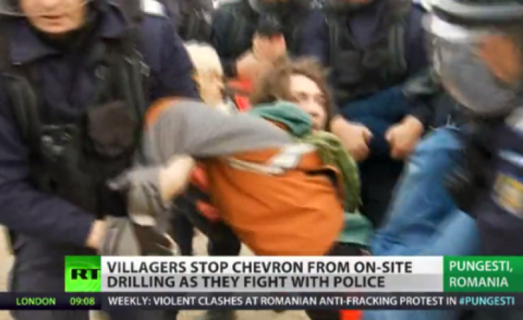 Villagers clash with riot police at Pungesti. Image: RT.com