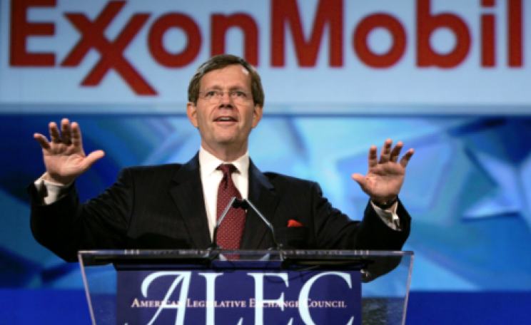 Former EPA Administrator Michael Leavitt speaks at an ALEC event sponsored by ExxonMobil, among other dirty energy interests and Fortune 500 companies. (AP Photo/Elaine Thompson)