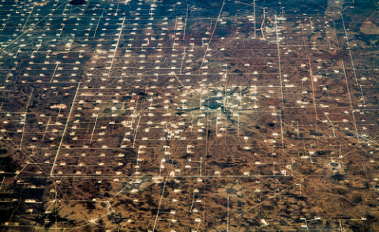 A fracked landscape South of Odessa, Texas. Photo: Dennis Dimick via Flickr.com.
