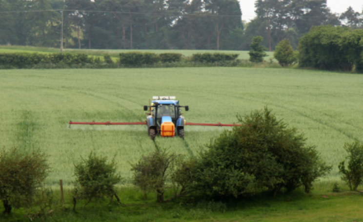 Crop spraying near Harvington, Worcestershire, England. Photo: muffinn via Flickr.com.
