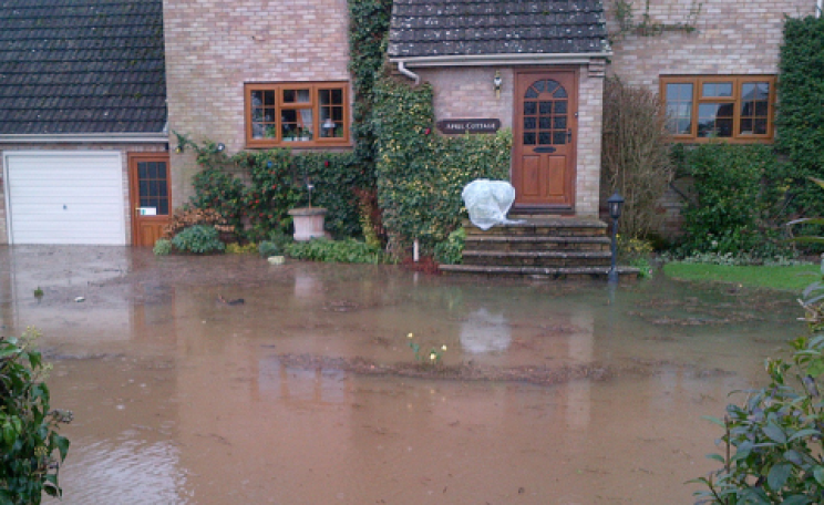 A flooded home, recently built, at Severn Stoke, Worcester. Photo: Dave Throup.