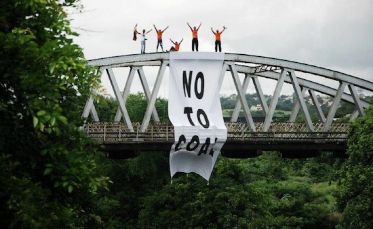 'No to coal' banner over bridge on the way to the power plant site. Photo: Naresh Roodur.