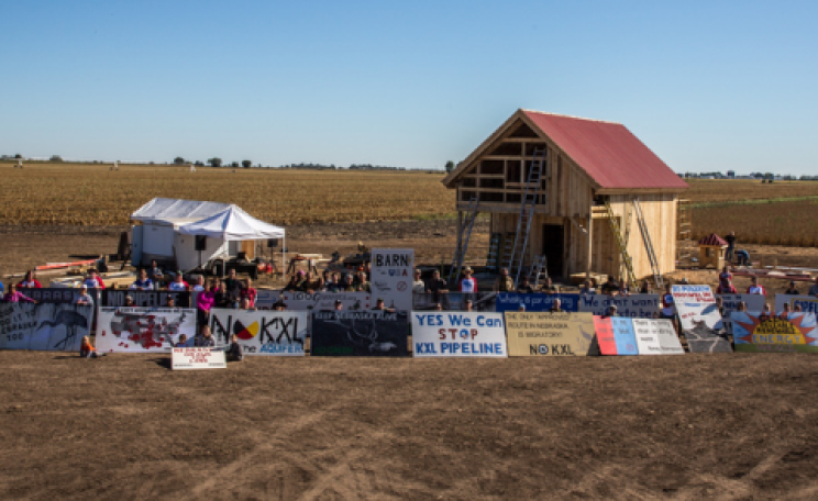 Bold Nebraska draws the line - ranchers and farmers have built a renewable energy powered barn in the path of the Keystone XL pipeline. Photo: 350.org via Flickr.com.