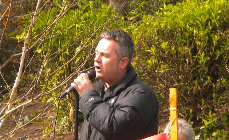 Dominic Dyer addressing a public meeting against the badger cull in Exeter. Photo: Lesley Docksey.