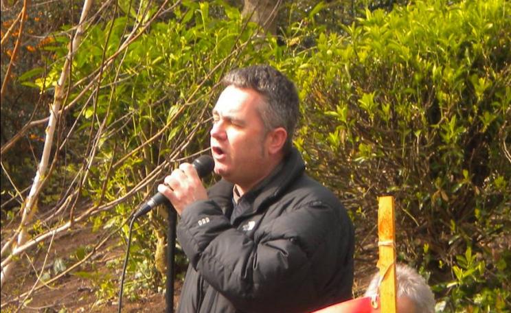 Dominic Dyer addressing a public meeting against the badger cull in Exeter. Photo: Lesley Docksey.