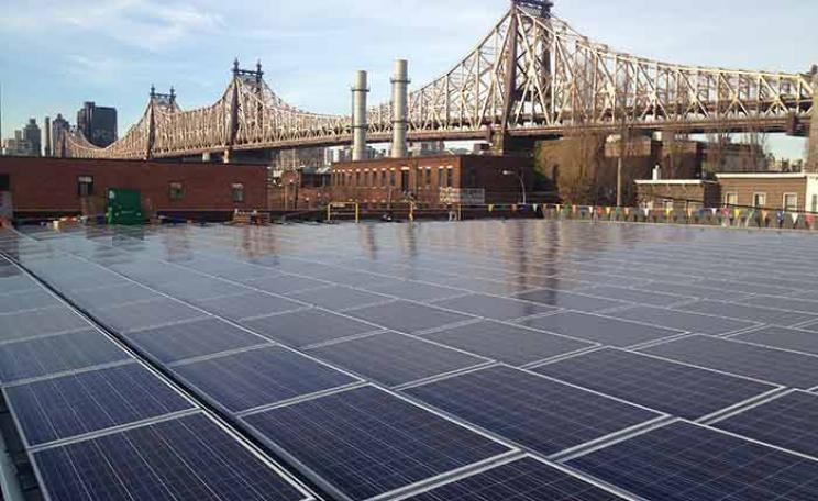 Dykes Lumber’s rooftop solar installation in Long Island City near the Queensboro Bridge. Photo: Steve Burns, EnterSolar.