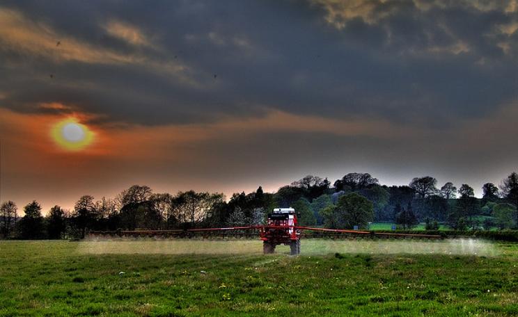 "If the driver feels the need to protect himself with a face mask, surely he should reconsider spraying right outside our front door?" Photo: Will Fuller via Flickr.com.