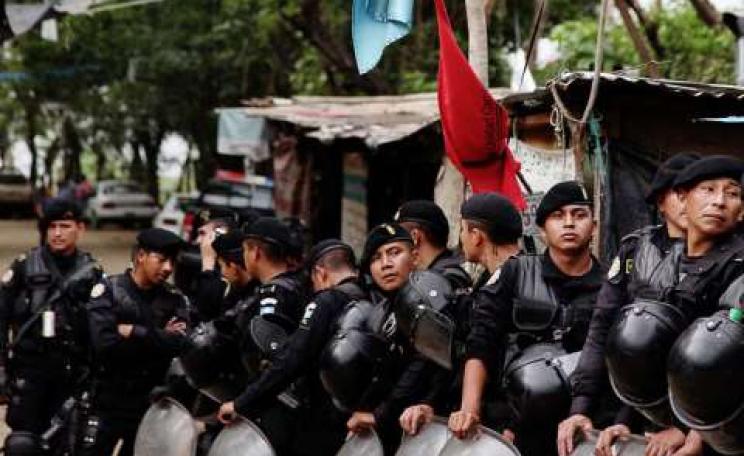 Police confront a peaceful demonstration against the Exmingua mine, owned by Canadian Radius Gold Corporation, in San José del Golfo, Guatemala. Photo: Briss Milián via Flickr.