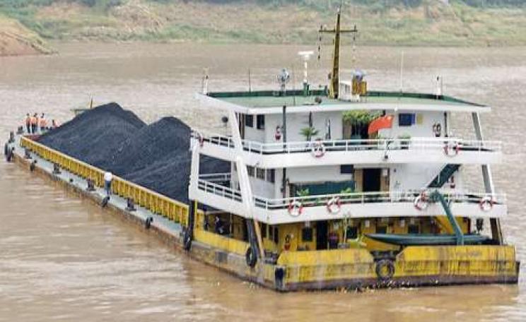 Will this coal on a Chinese barge on the Yangtze River end up being 'consumed' in the US and Europe? Photo: Marshall Segal via Flickr.